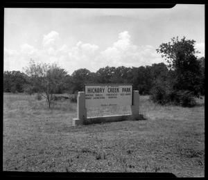 Primary view of object titled '[Photograph of Hickory Creek Park sign]'.