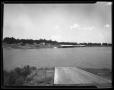Photograph: [Photograph of Unidentified Body of Water and Boat Ramp]