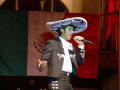 Primary view of [Man with sombrero and microphone]