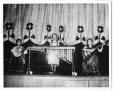 Photograph: [Young musicians on stage]