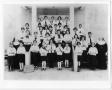 Photograph: [Two nuns with female students]