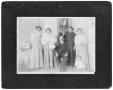 Photograph: [Photograph of one men, four women and one baby]