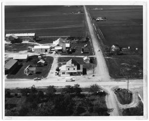 Primary view of object titled '[Aerial View of Danevang Farmers Co-op and Surrounding Properties]'.