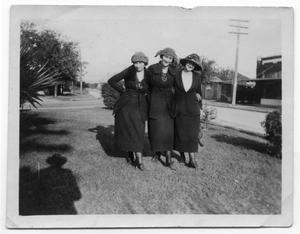 Primary view of object titled '[Three Similarly Dressed Women Standing on a Lawn in San Antonio]'.