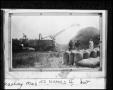 Photograph: Threshing Machine Blowing Out Rice Straw