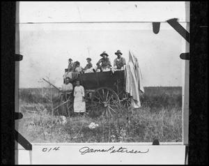 Primary view of object titled 'Andersen Family in Cotton Wagon'.