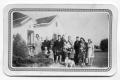 Photograph: [Hansen Family in Posed for a Portrait in Front of a House]