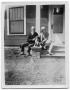 Photograph: [Young Woman and Elderly Man with Dog]