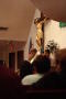 Photograph: [Crucifix is seen above the alter during services]