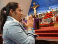 Photograph: [Woman prays in front of an alter decorated for Christmas]