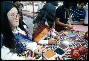Primary view of object titled '[Tigua Bead Work Demonstrations]'.