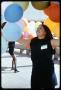 Photograph: [Woman Releasing Balloons]