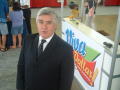 Thumbnail image of item number 1 in: '[Arturo Violante standing in front of Viva Dallas booth]'.