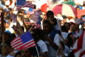 Primary view of [Boy protester with American flag]