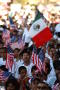 Photograph: [Immigration Protesters Wave American and Mexican Flags]