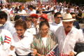 Photograph: [Immigration Protesters Marching With Signs and American Flags]