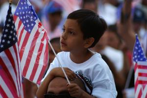 Primary view of object titled '[Boy with American flag]'.