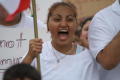 Thumbnail image of item number 1 in: '[Close-up view of female protester with mouth open]'.