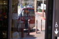 Thumbnail image of item number 1 in: '[Minivan reflection on JPS door]'.