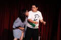 Photograph: [Man and woman perform a skit]