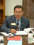 Photograph: [Rudy Rodriguez takes part in a meeting]