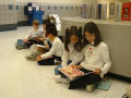 Primary view of [Students read to each other at Seminary Hills Elementary]