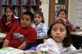 Primary view of [Students pay attention in a class at Crockett Elementary]
