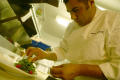 Primary view of [Chef with salad of micro vegetables]