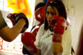 Photograph: [Girl in red boxing gloves]