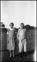 Photograph: [Photograph of Two Women Standing Outside]