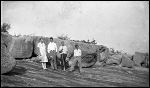Primary view of object titled '[Photograph of a Group of Four People]'.