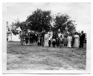 Primary view of object titled '[Photograph of the Comanche Tribe at Centennial Celebration]'.