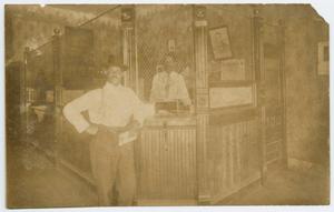 Primary view of object titled '[H.L. Price and Sammie Hatch at the Farmer and Citizen's Bank]'.