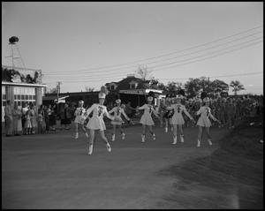 Primary view of object titled '[Cleveland High School Royal Braves Marching Band and Twirlers in Santa Parade]'.