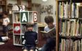Thumbnail image of item number 1 in: '[Three unidentified boys in Emily Fowler Public Library]'.