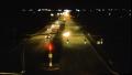 Photograph: [Night scene of Carroll Blvd in Denton, Texas]