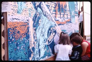 Primary view of object titled '[Coloring Mural at Dogwood Festival]'.