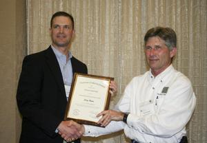Primary view of object titled '[Craig Bonds accepts award at the 2012 annual meeting banquet]'.