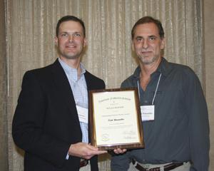 Primary view of object titled '[Kirk Winemiller accepts award at the 2012 annual meeting banquet]'.