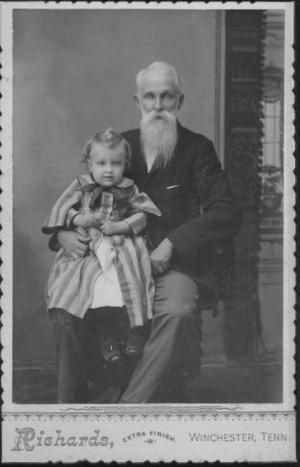 Primary view of object titled '[Man with long, white beard holding child]'.