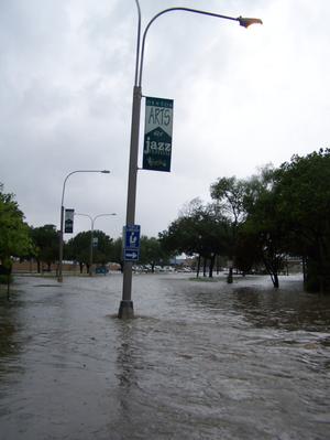 Primary view of Photograph of Flood waters at the Denton Public Library, Emily Fowler Central Library]