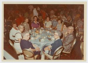 Primary view of object titled '[People at a Dinner Party]'.