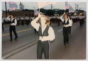 Primary view of object titled '[Clear Creek Flag Corps in a Parade]'.