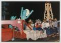 Photograph: [Cowboy-Themed Parade Float]