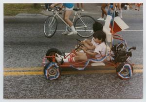 Primary view of [Kids Riding a Go-Kart]