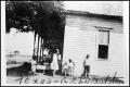 Photograph: [Children Playing in a Yard]