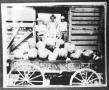 Photograph: Four Men Standing by a Wagon of Watermelons