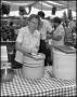 Thumbnail image of item number 1 in: '[Woman Making Sauerkraut]'.