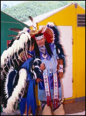 Primary view of object titled '[Alabama-Coushatta Dancers Talking to Each Other]'.