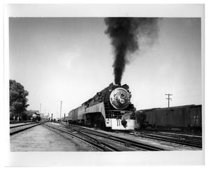 Primary view of object titled '[Locomotive departing from Tucson, Arizona]'.